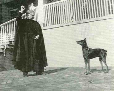 A favorite pastime of Father Walsh was his pet Doberman, Prince. in 1943