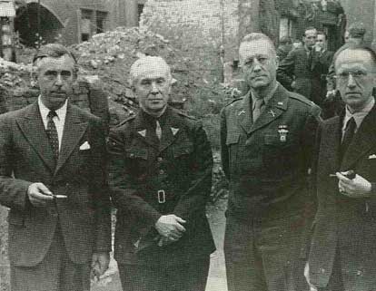 Frankfurt, 1946. Father Walsh is photographed with the German Minister of the Interior, Hans Venedey, Major Wessels of the U.S. Army, and Professor W. Hallstein, Rector of Frankfurt University.